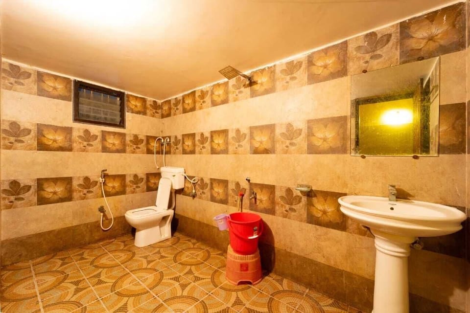 Standard Quadruple Room, Garden View | Bathroom | Shower, towels, soap, shampoo