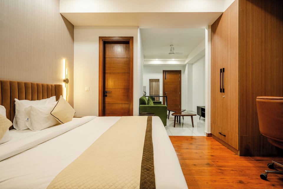 Premium bedding, desk, laptop workspace, blackout drapes