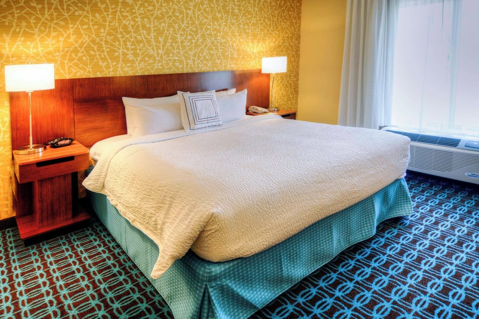 Premium bedding, desk, blackout drapes, iron/ironing board