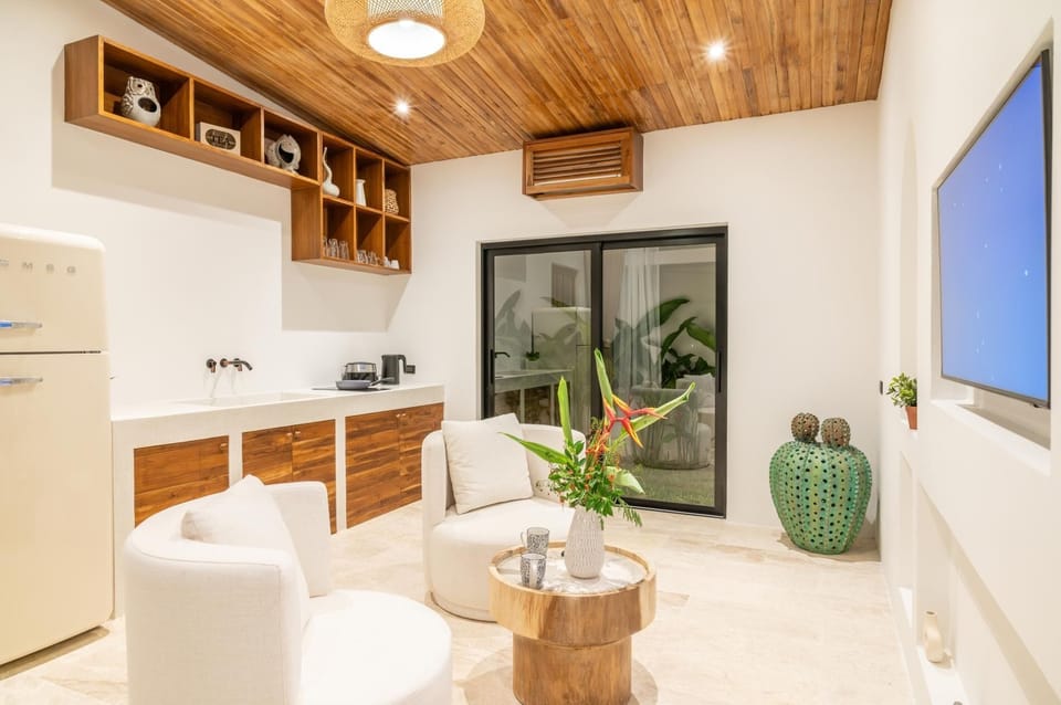 Villa, Pool View | Living area | Flat-screen TV