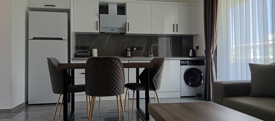 Family Condo, Sea View | Living area | 99-cm LED TV with cable channels, Netflix, Hulu