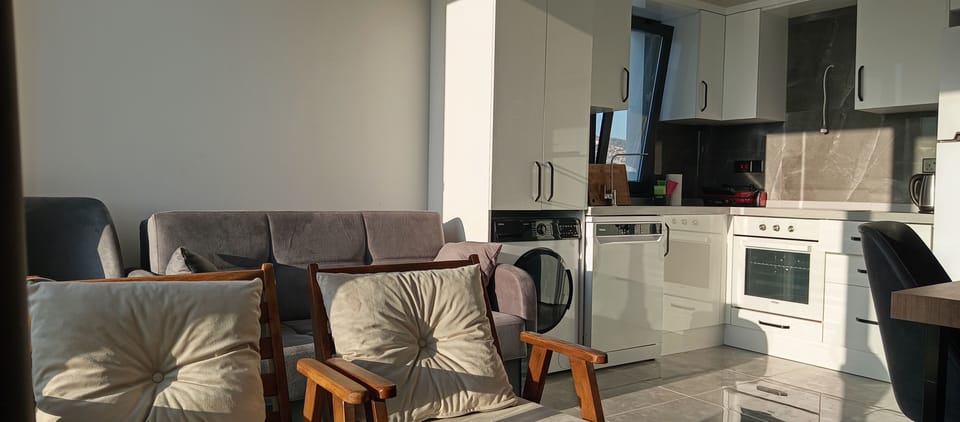 Family Condo, Sea View | Living area | 99-cm LED TV with cable channels, Netflix, Hulu