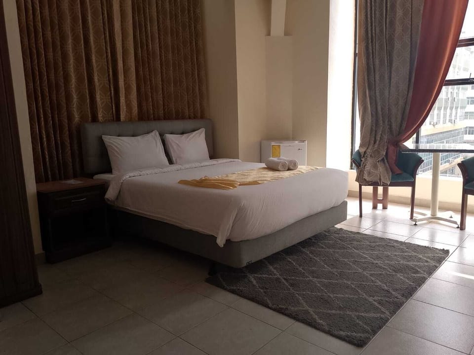 Down comforters, desk, WiFi (free), bed sheets