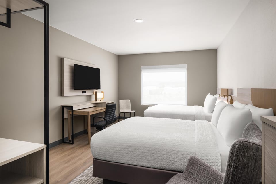 Standard Room, 2 Queen Beds, Non Smoking, Kitchenette | Individually furnished, desk, laptop workspace, blackout drapes