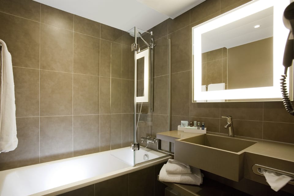 Eco-friendly toiletries, hair dryer, towels