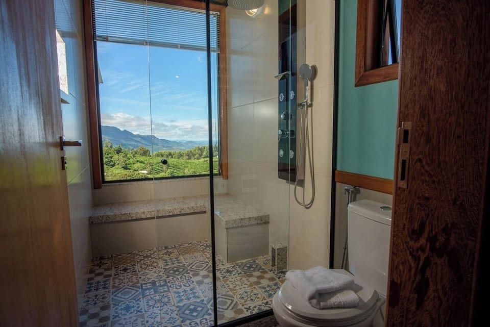Deluxe Chalet, Balcony, Mountain View | Bathroom | Separate tub and shower, free toiletries, hair dryer, bathrobes