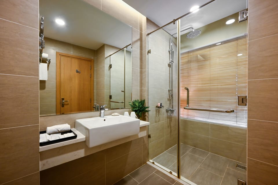 Shower, free toiletries, hair dryer, slippers