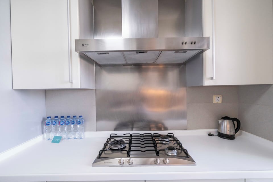 Superior Apartment, 3 Bedrooms, Kitchen, City View | Private kitchen | Dining tables