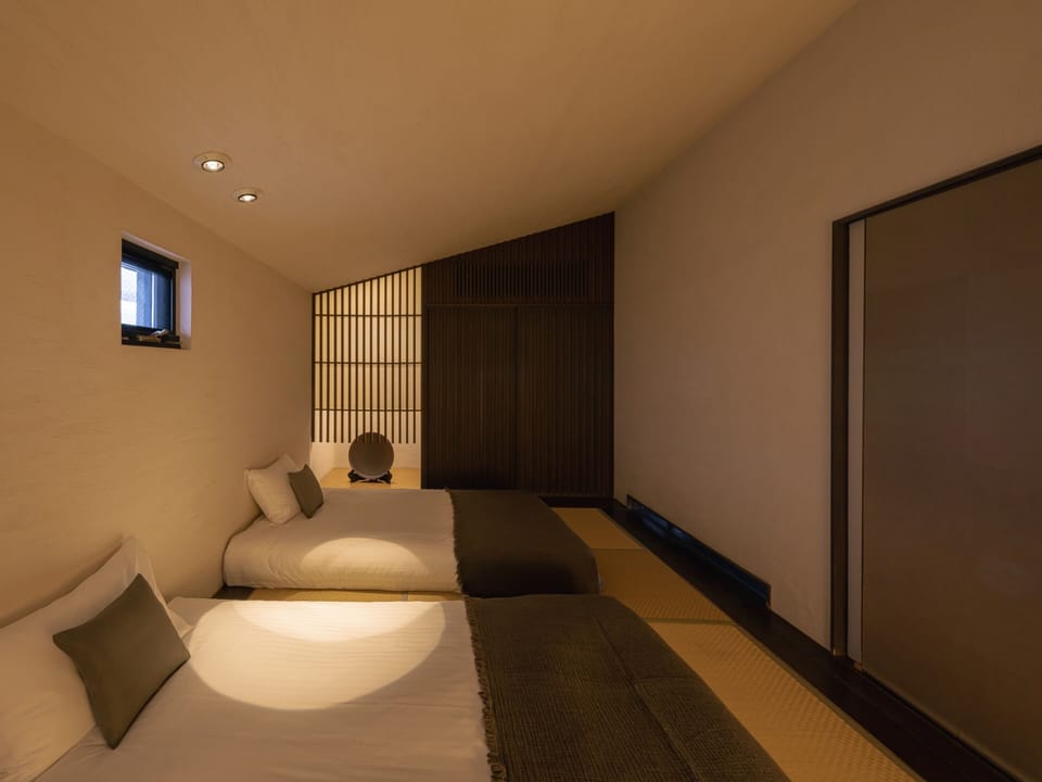 Four-Bed Suite with Semi-Open-Air Onsen | Down comforters, in-room safe, individually decorated