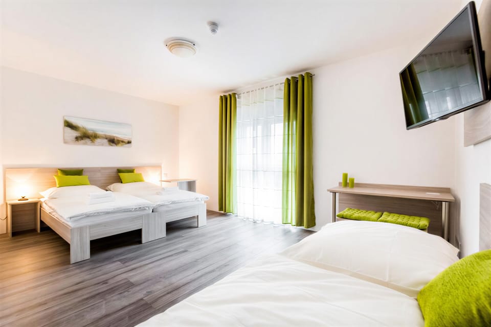 Family Triple Room | Desk, laptop workspace, free WiFi, bed sheets