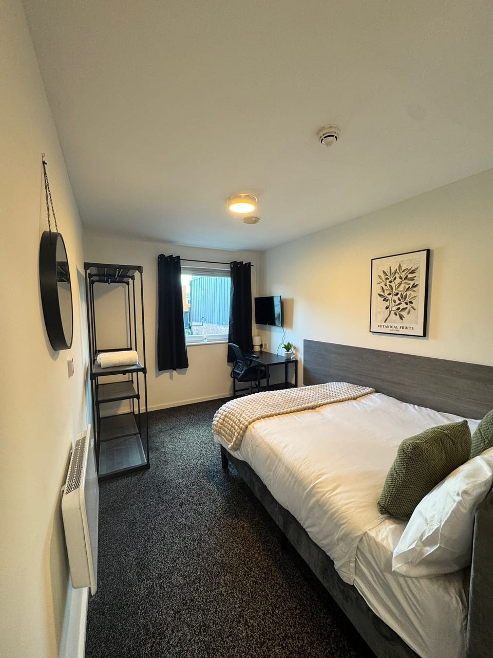 Economy Double Room | Desk, laptop workspace, blackout drapes, iron/ironing board
