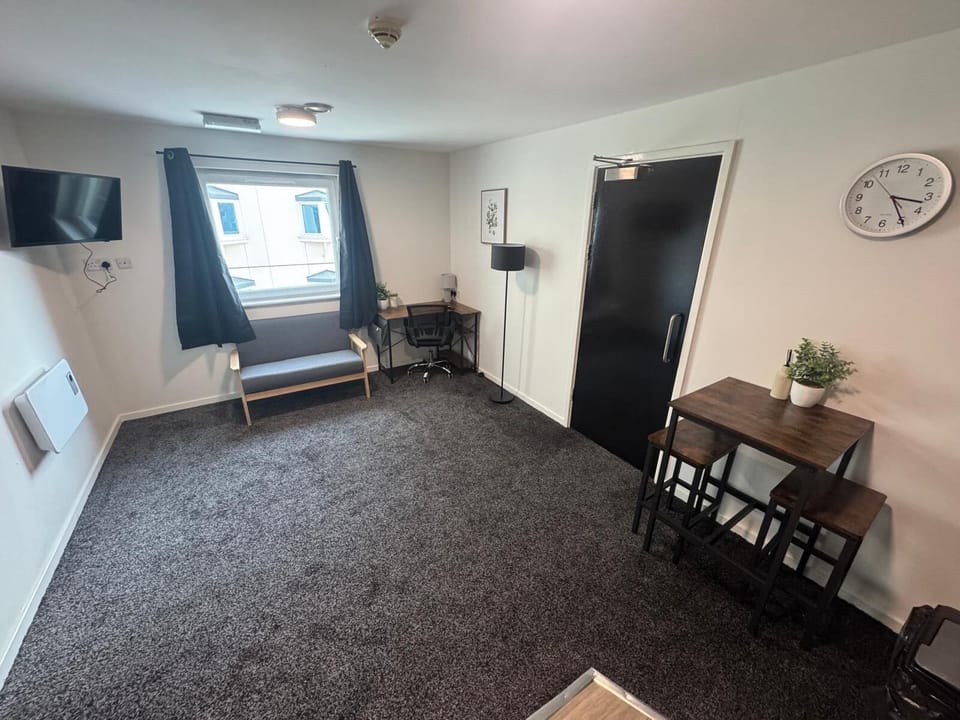 Economy Apartment, 1 Double Bed with Sofa bed | Living area | 32-inch TV with digital channels