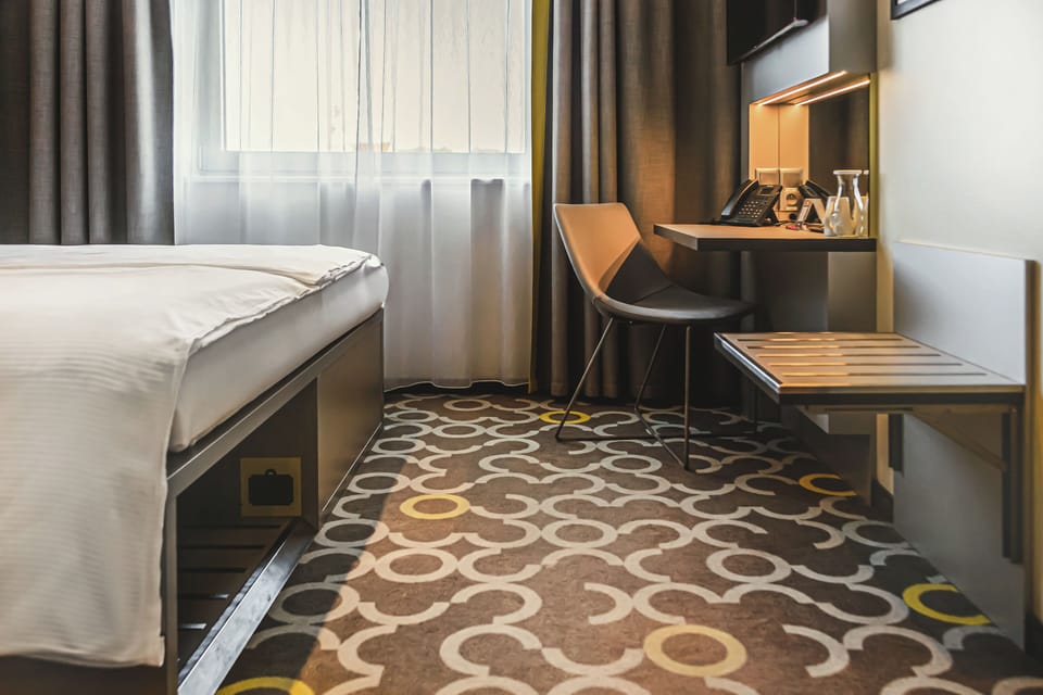 Premium bedding, blackout drapes, soundproofing, iron/ironing board