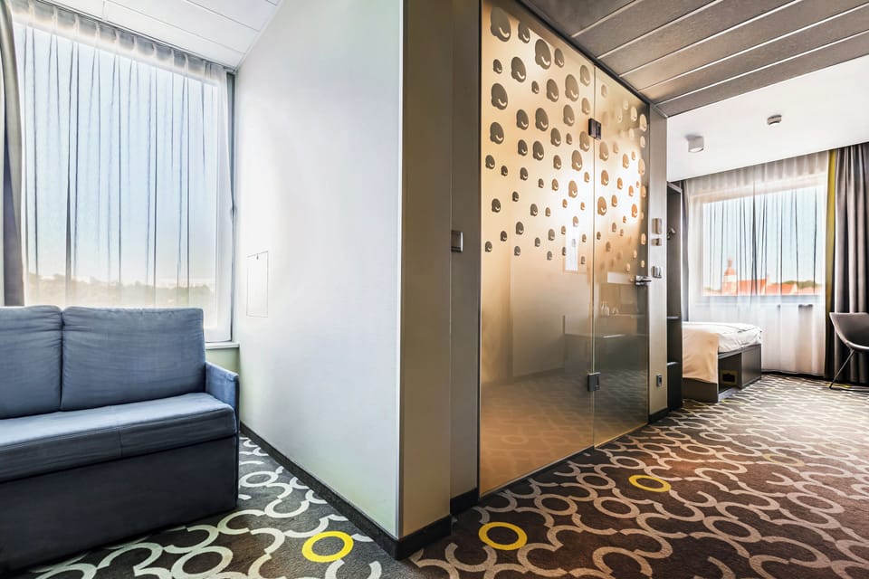 Family Room | Premium bedding, blackout drapes, soundproofing, iron/ironing board