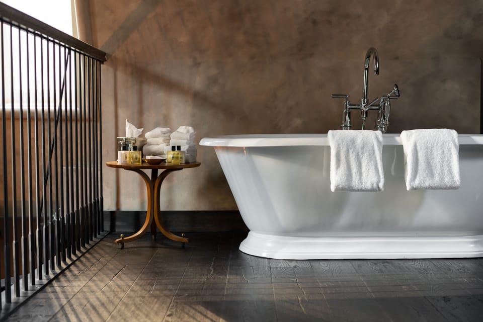 Designer toiletries, hair dryer, bathrobes, slippers