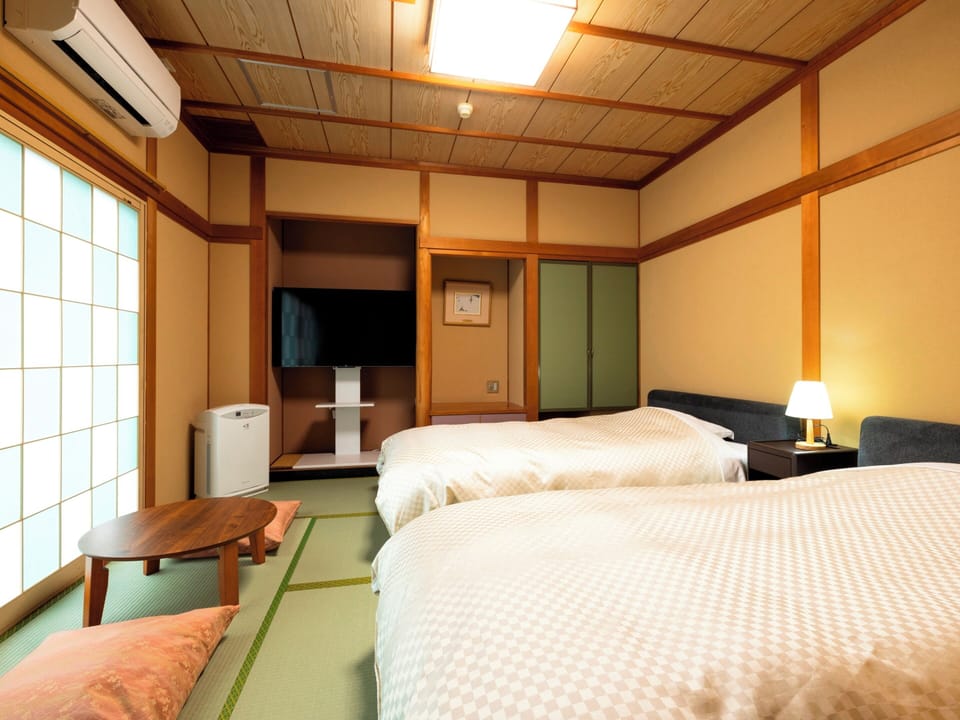 Twin Room, Non Smoking | Free WiFi, bed sheets