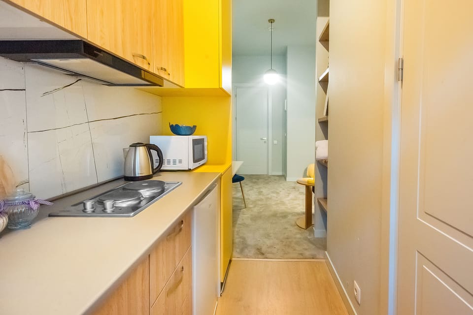 Single Room, City View | Private kitchen | Mini-fridge