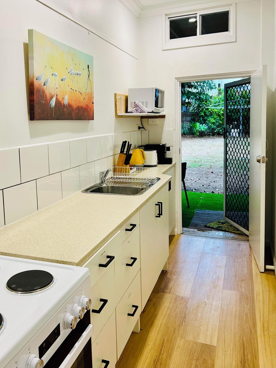 Comfort Apartment, Garden View | Private kitchen | Full-size fridge, microwave, stovetop, electric kettle