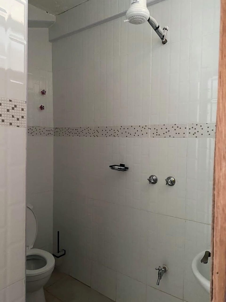Shower, slippers, towels, soap