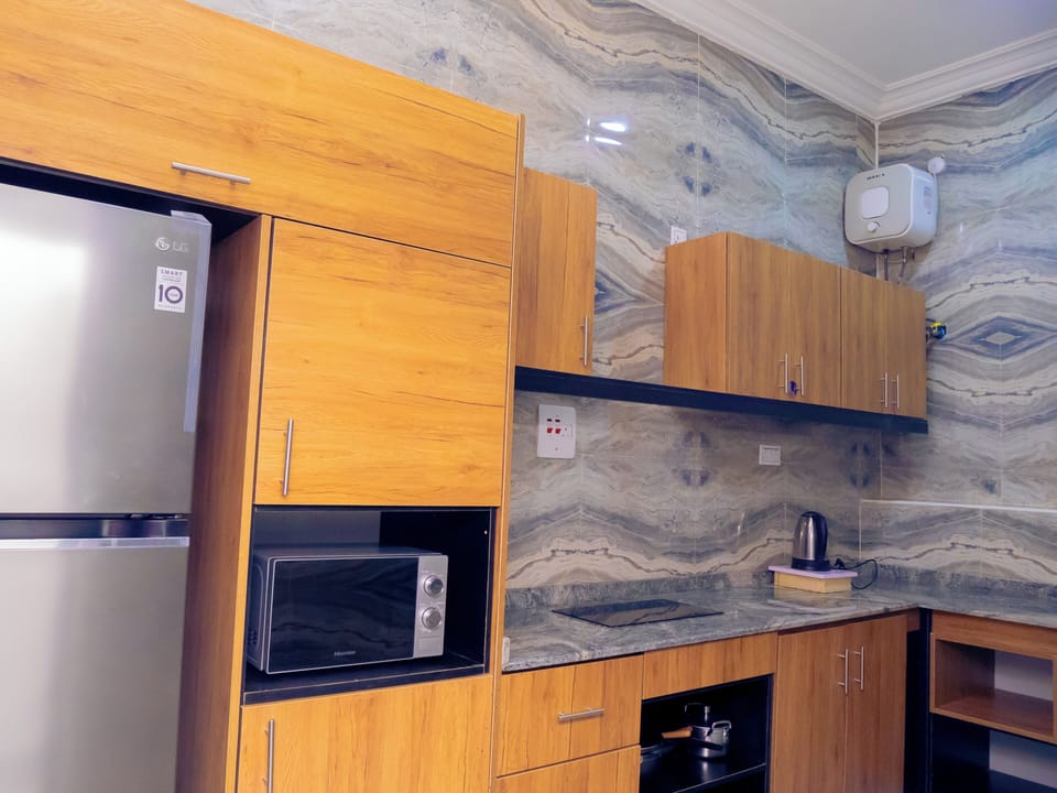 Presidential Penthouse, 1 Bedroom | Private kitchen | Fridge, microwave, dining tables