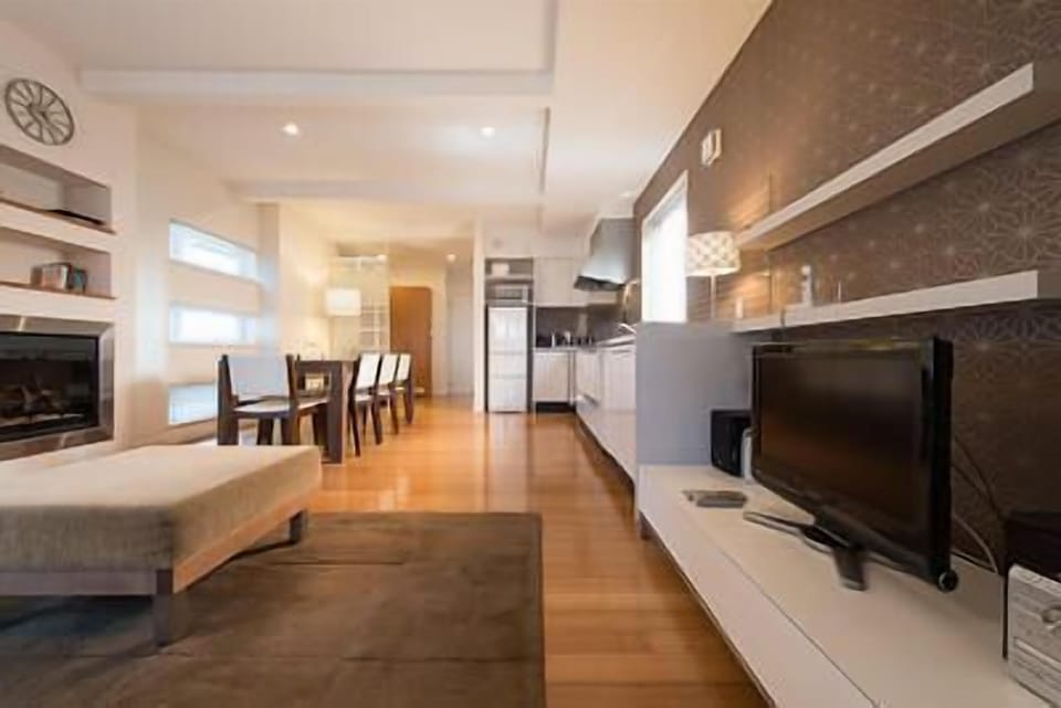 Villa (8 person) | Living room | 35-inch flat-screen TV with satellite channels, TV, DVD player