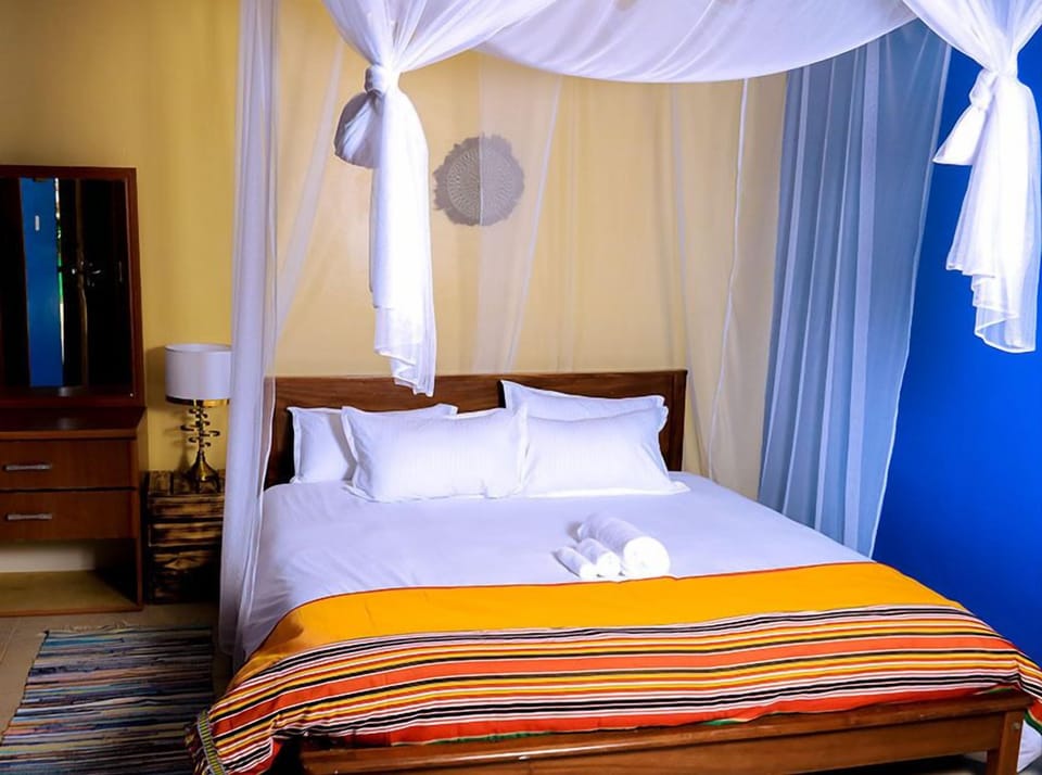 Deluxe Double Room, Garden View | Desk, laptop workspace, iron/ironing board (on request), WiFi (free)