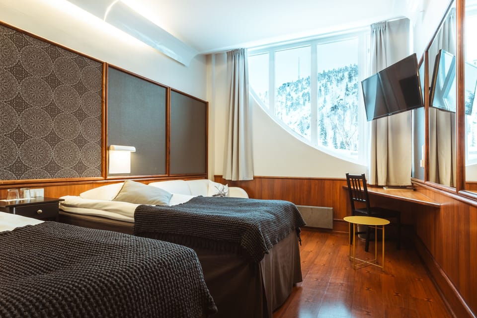 In-room safe, laptop workspace, blackout drapes, soundproofing