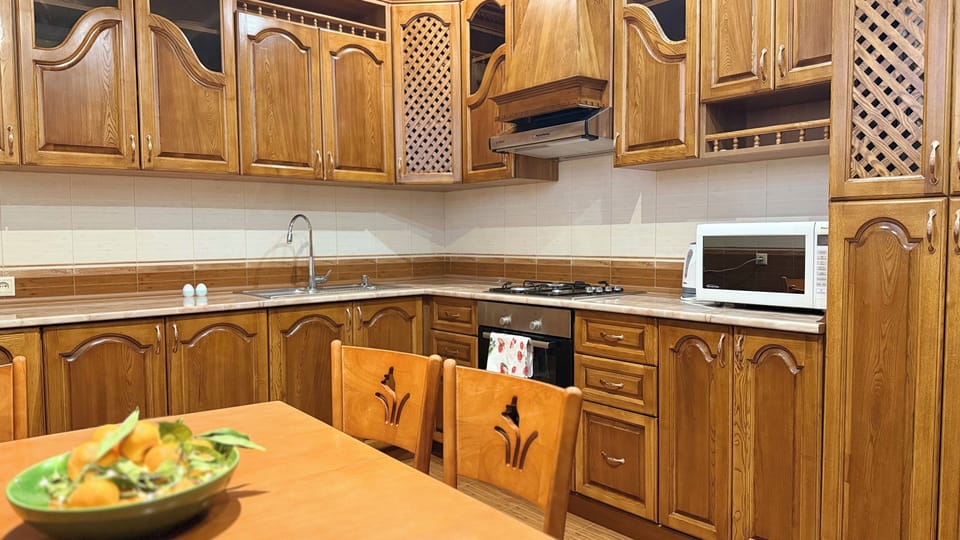Luxury Apartment, 2 Bedrooms, 2 Bathrooms, Courtyard View | Private kitchen | Fridge, coffee/tea maker, electric kettle, cookware/dishes/utensils