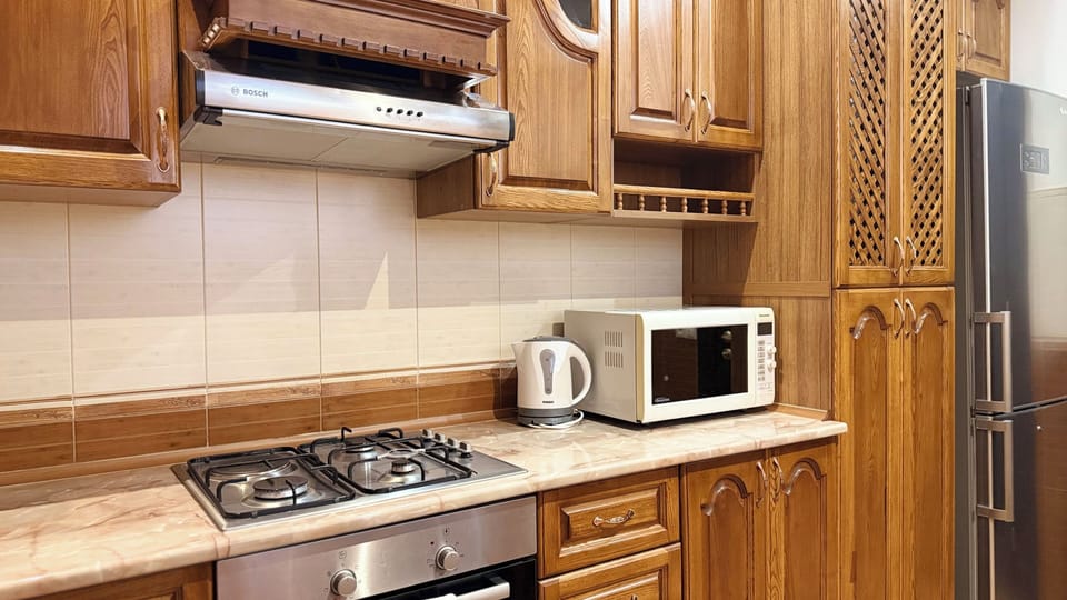 Luxury Apartment, 2 Bedrooms, 2 Bathrooms, Courtyard View | Private kitchen | Fridge, coffee/tea maker, electric kettle, cookware/dishes/utensils