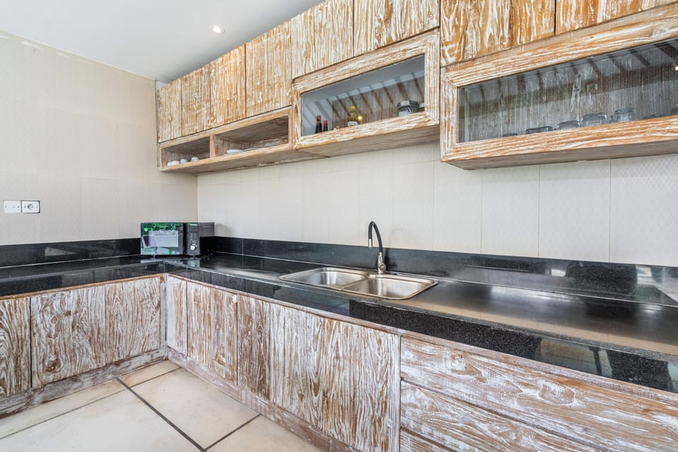 Family Villa, 3 Bedrooms, Non Smoking | Private kitchen | Fridge, microwave, highchair, cookware/dishes/utensils