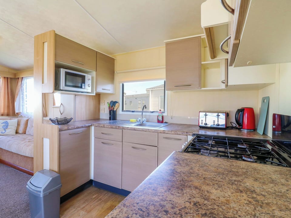 Fridge, microwave, toaster, cookware/dishes/utensils
