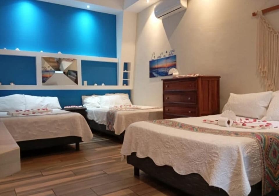 Memory foam beds, free minibar items, in-room safe