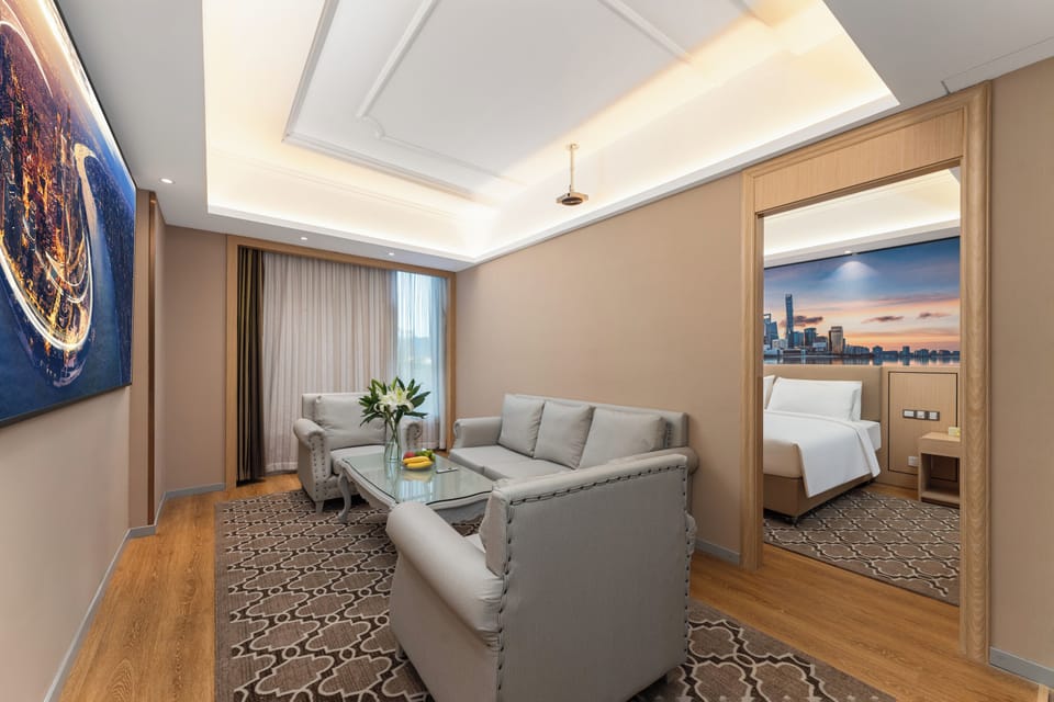 Executive Suite | Living area | TV, printers