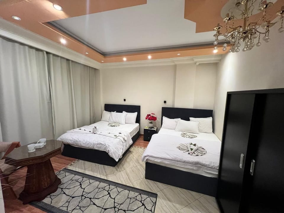 Premium bedding, pillowtop beds, in-room safe, laptop workspace