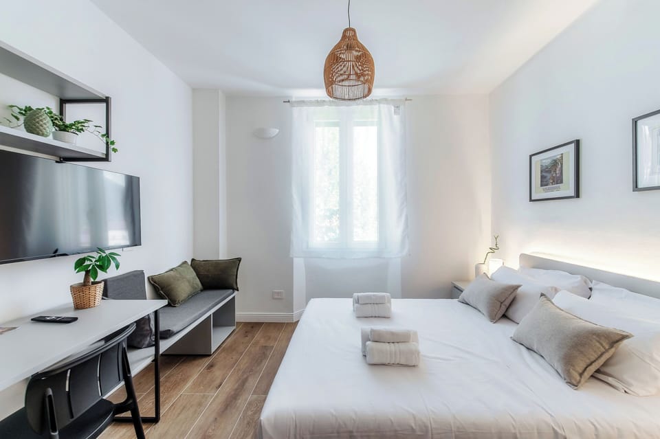 Deluxe Double Room, Partial Lake View | Blackout drapes, soundproofing, iron/ironing board, free WiFi