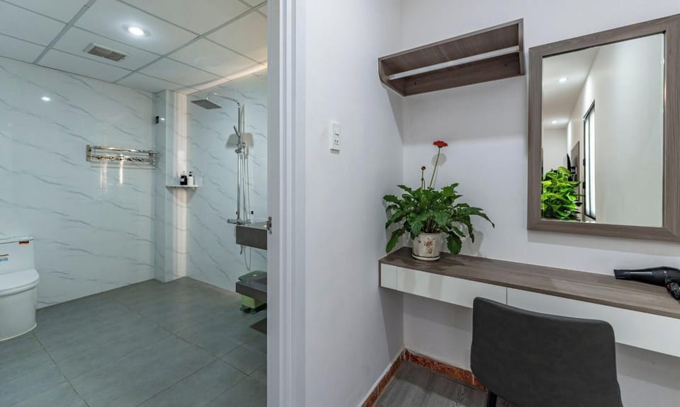 Family Quadruple Room, Balcony, City View | Bathroom | Shower, hair dryer, towels, soap