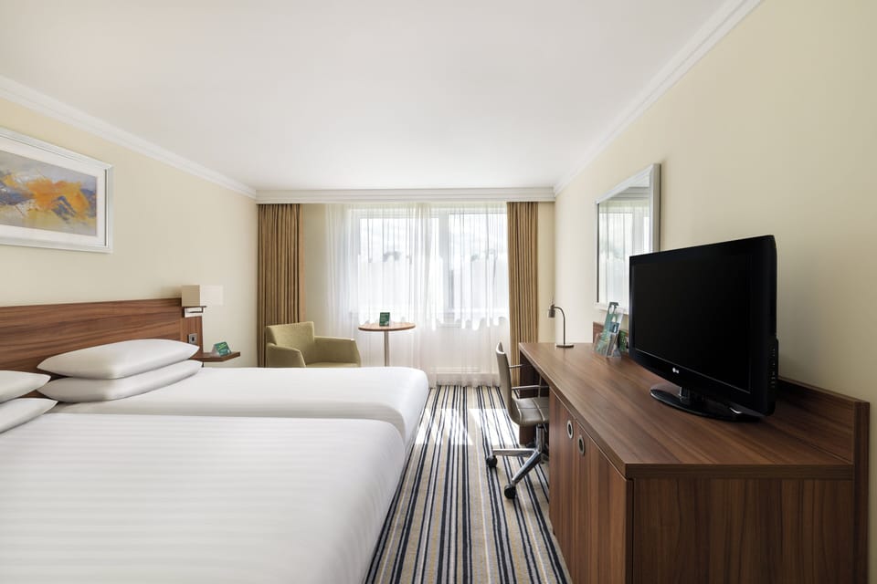 In-room safe, desk, iron/ironing board, free cribs/infant beds