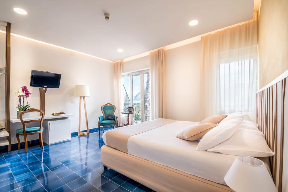 Superior Double Room, 1 Double or 2 Twin Beds, Balcony, Sea View | In-room safe, desk, free WiFi, bed sheets