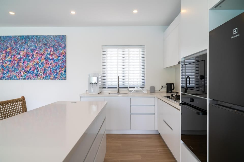 Villa, Patio, Sea View | Private kitchen | Electric kettle, toaster, dining table