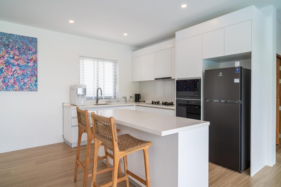 Villa, Patio, Sea View | Private kitchen | Electric kettle, toaster, dining table