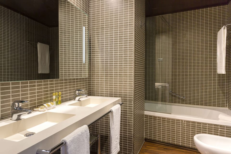 Eco-friendly toiletries, hair dryer, towels
