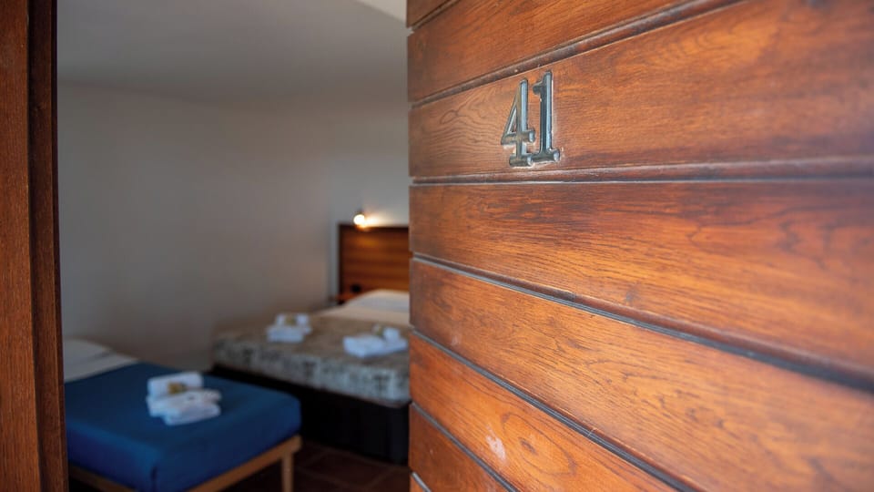 Triple Room | Blackout drapes, free WiFi