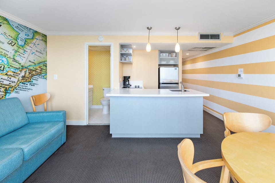 Deluxe Ocean Front Efficiency 4th Floor | Private kitchen | Fridge, microwave