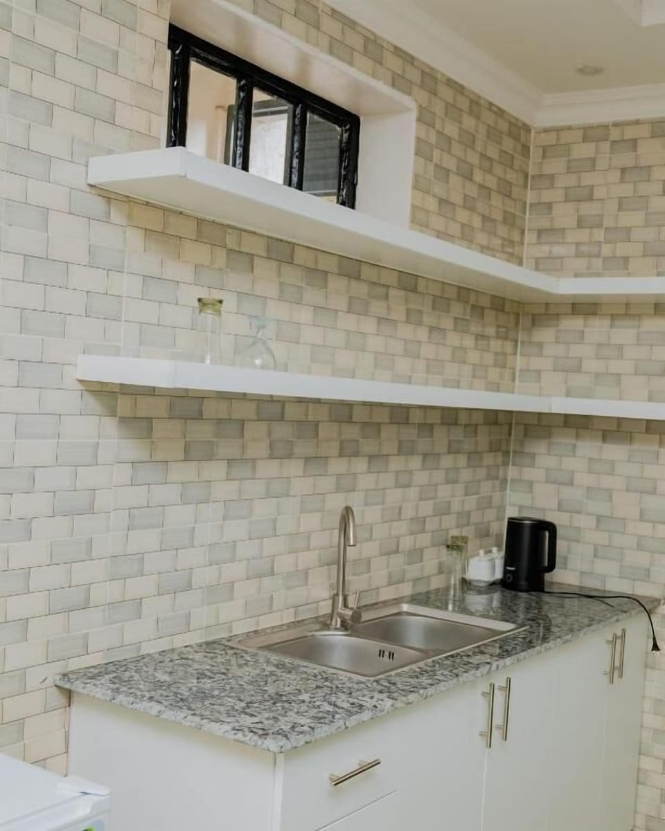 Basic Room, 1 Bedroom, Balcony, Garden View | Private kitchen | Fridge, cleaning supplies, paper towels
