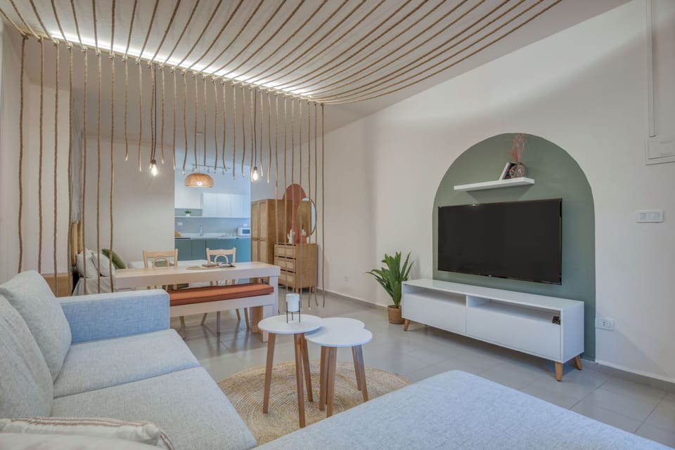 Studio, 1 Double Bed, Kitchenette, Mountain View | Living area | 55-inch Smart TV with digital channels, streaming services