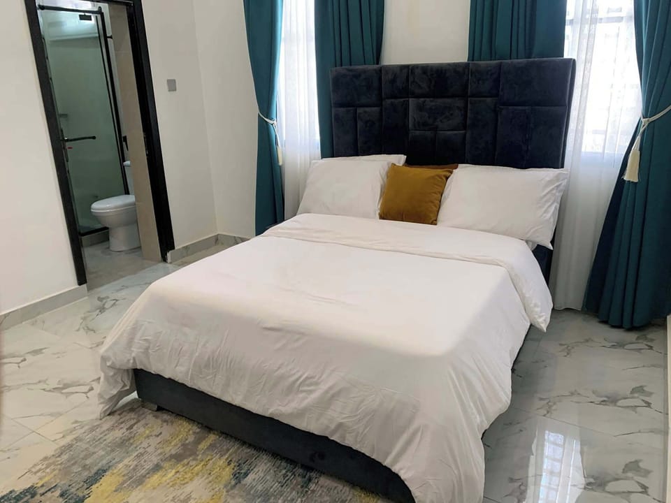 Deluxe Apartment, Balcony, City View | Desk, laptop workspace, blackout drapes, soundproofing