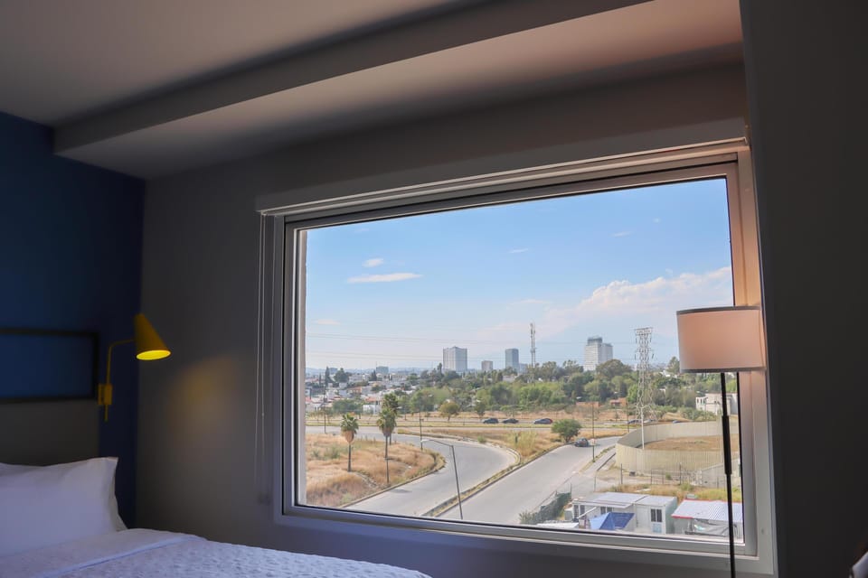 Premium bedding, Select Comfort beds, in-room safe, blackout drapes