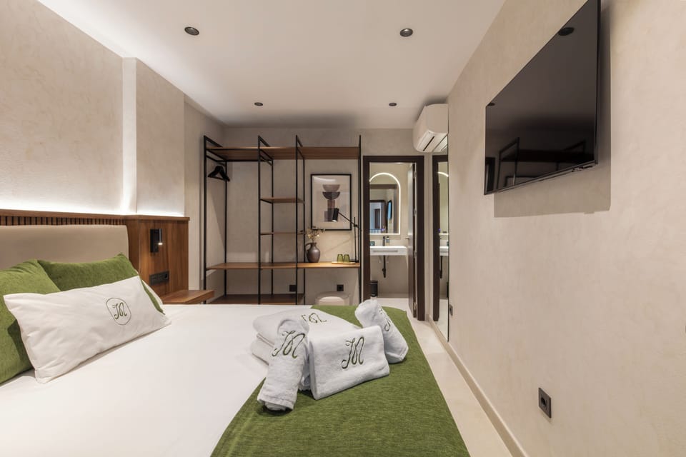 Double Room | Down comforters, blackout drapes, free WiFi, bed sheets