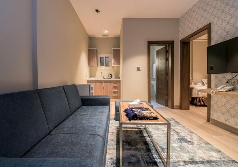 Suite, 2 Bedrooms | Living area | TV