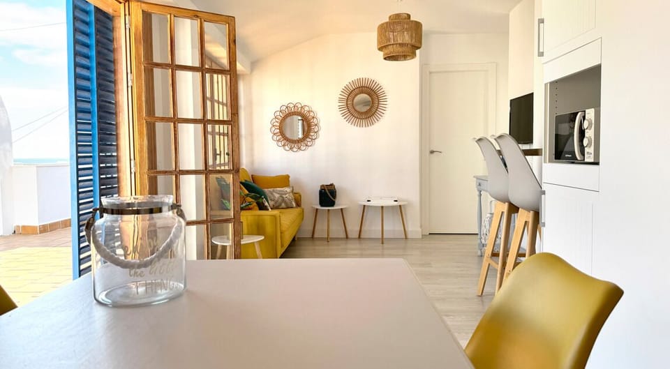 Deluxe Apartment, Sea View | Living area | TV